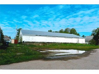 <b>TRACT #1 - GRAIN ELEVATOR</b>  (<b>SOLD - 9/9/16 $110,000</b>)
Note:  The grain bins, drier and legs are on R.R. leased property.  Mr. Voreis stated that lease payment is $900/year.

<b>Improvements - Grain Bins, Drier & Legs:</b>
1994     90,000 bu. bin with air tubes
1994     15,000 bu. hopper bin
               7,000 bu. bin
             42,000 bu. bin with air tube
<b>Drier:</b>  12'x45';1994 Zimmerman grain drier; S.S. 1,500 bu./hr. at 10 pts.;Natural gas
<b>Leg:</b>  1994 110' grain leg; 8,000 bu./hr.
<b>Drier Grain Leg:</b>  5,000 bu./hr.
<b>North Leg:</b>  7,000 bu./hr.
<b>Top Conveyor:</b>  1994 Chain Conveyor
<b>Bottom Conveyor:</b>  U-Trough Auger
<b>Dump Pit:</b>  Approx. 150 bu. with auger to leg

<b>Office:  Portable</b>  A 10' x 50' office with 2 separate offices, customer counter area, 1 restroom

<b>Grain Probe:</b>  A Hyd. Grain Probe

<b>Scales:</b>  10' x 60' Metal deck, scales, load cells, 100,000 lb. capacity, digital read-out and printer

<b>Quonset:</b>  A 41' x 120' metal Quonset building with concrete floor, top auger with 70,000 bu. capacity.

<b>Shop:</b>  A 22' x 40' wood frame with metal siding, concrete floor, heater

<b>Rail Siding:</b>  7+ Car rail siding along the east side of the grain bins.

<b>Utilities:</b>  City - Water and sewer; Electric - 480 (4) phase; Gas - Nipsco 

<FONT FACE="Arial, Helvetica, sans-serif" size="2" color="#0000FF"><b>TRACT #2 - STORAGE WAREHOUSE</b> (<b>STILL AVAILABLE</b>)

<b>2 Lots, Improvements</b>  60' x 112' wood frame structure, concrete floors, 4 doors, dock high load-out.</font face>



 - Grain Elevator (SOLD - 9/9/16) Storage Warehouse Still Available